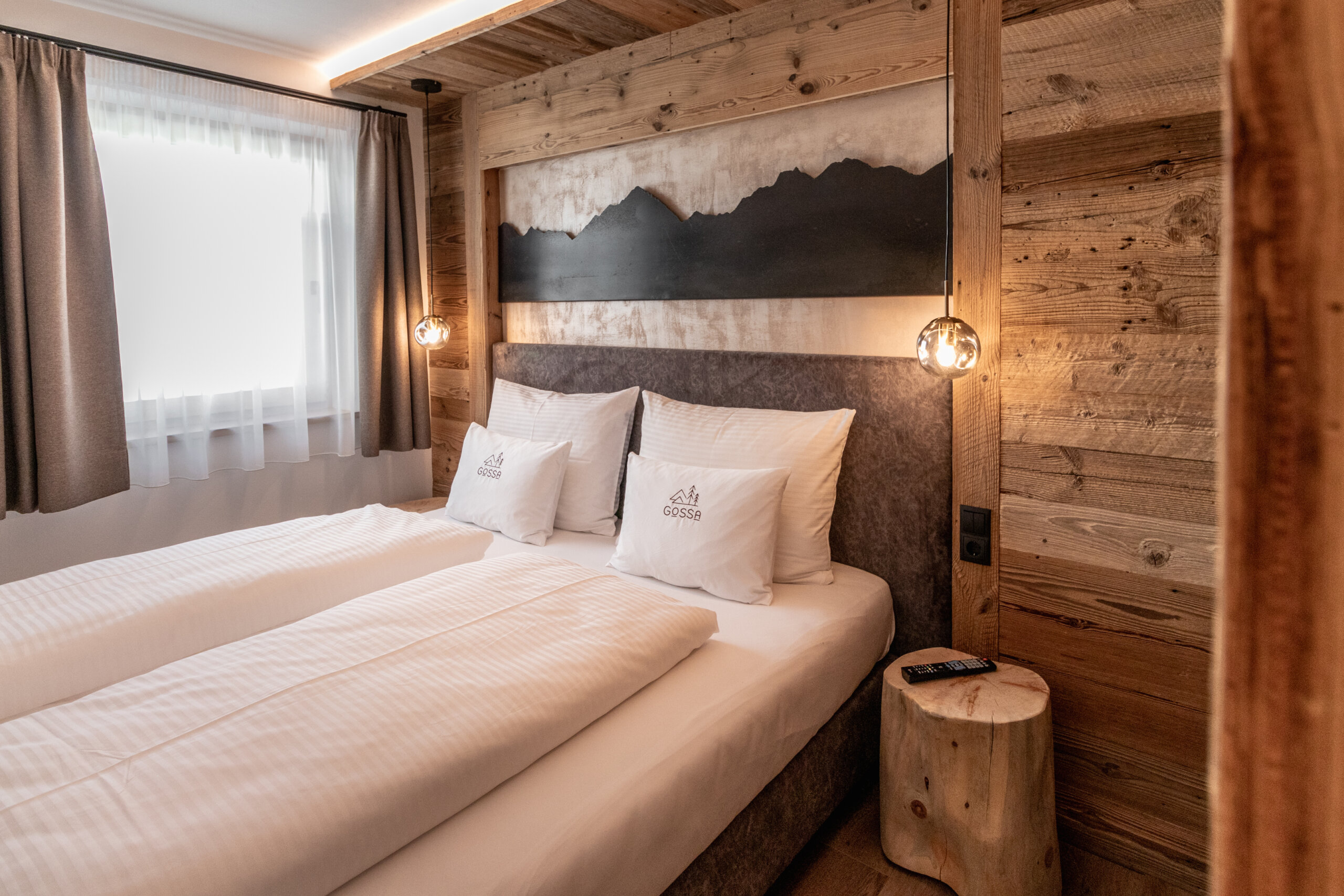 Letto matrimoniale della Chalet Suite Wiese